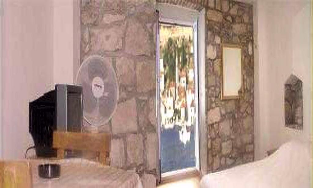 Apartments Acalinovic Vis Quarto foto